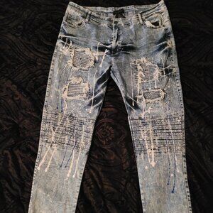 Men's urban streetwear paint splatter destroyed slimfit blue jeans